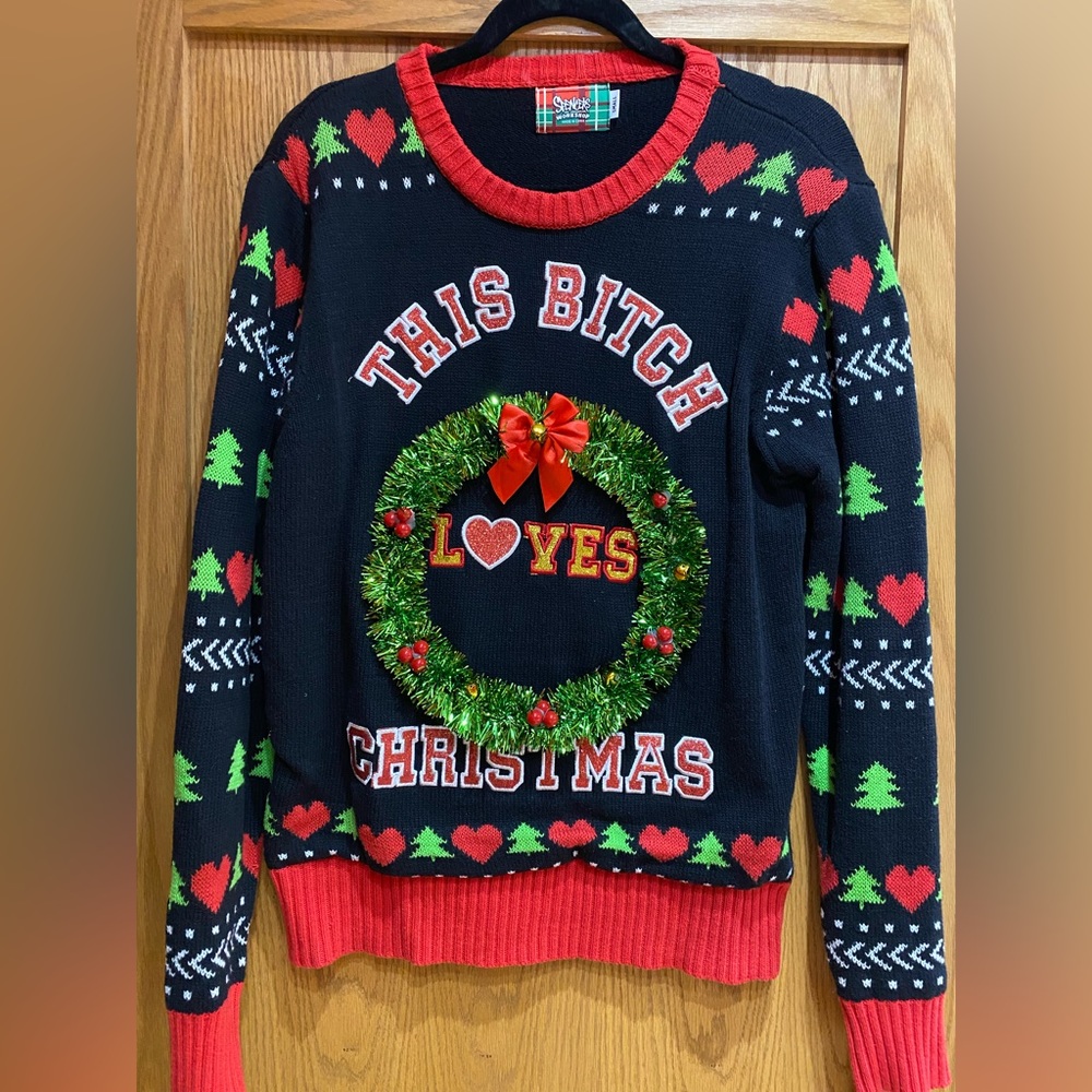 Spencer’s Women’s black ugly Christmas sweater which lights up. Size small.